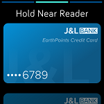 Fitbit Pay screen showing a credit card and instructions to hold the device near the reader to pay